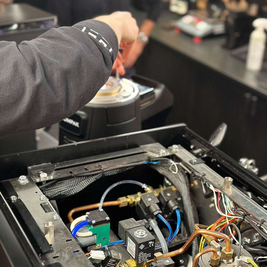 Espresso machine repair in the workshop