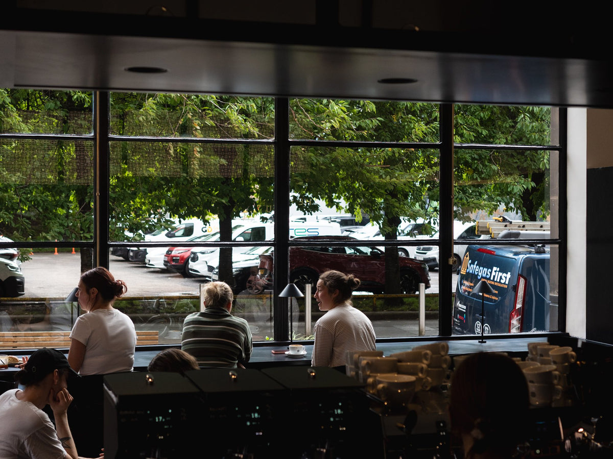 Customers at the window bar in Thomson's Candleriggs