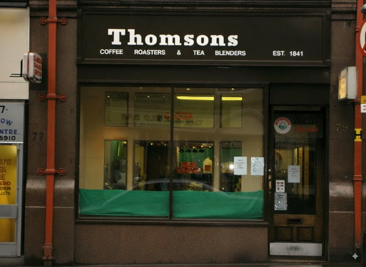 Thomsons coffee roasters and tea blenders storefront with green awning